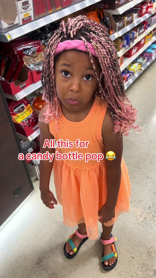 She saw that candy bottle pop at Walmart… I said no… she turned into a cartoon 😅 Had no choice but to say yes! #momlife #walmartfinds #candylover #momslife 